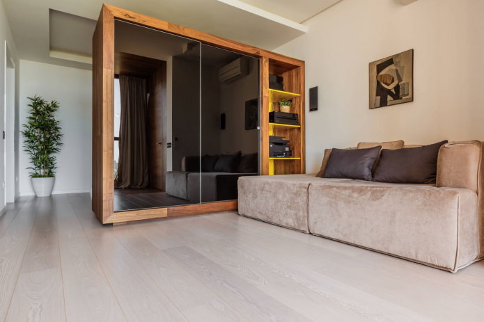 zoneamento com guarda-roupa na sala de estar