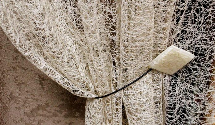 cortinas com padrão de teia de aranha