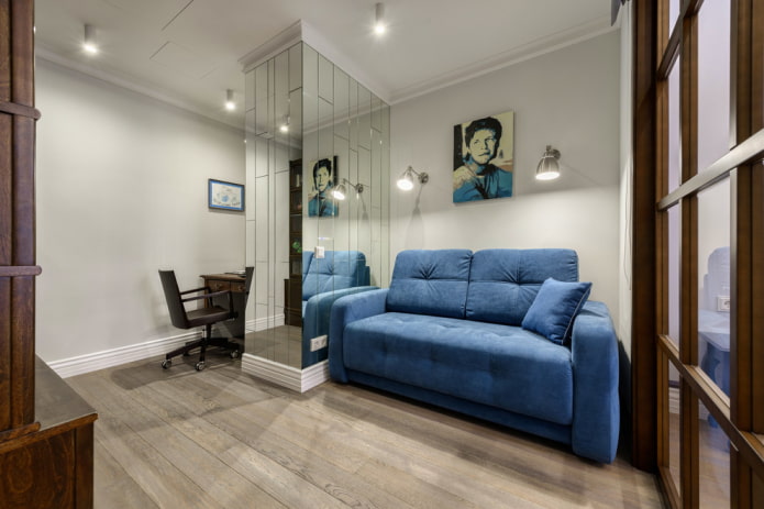cores de sofá azul no interior do escritório