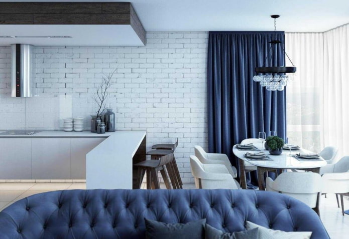 interior da cozinha e sala de estar em tons de azul