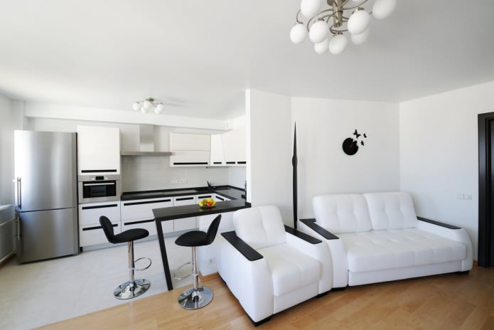 balcão de bar no design de uma cozinha-sala de estar em preto e branco