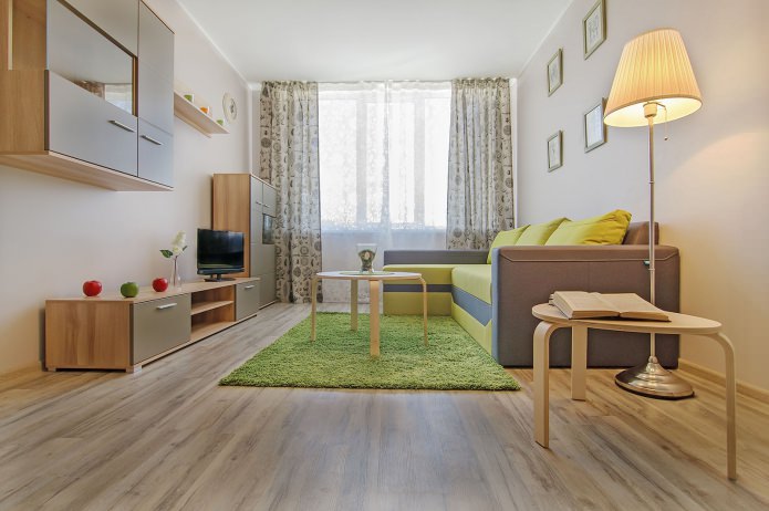 sala de estar no interior de um apartamento de um cômodo de 42 m².