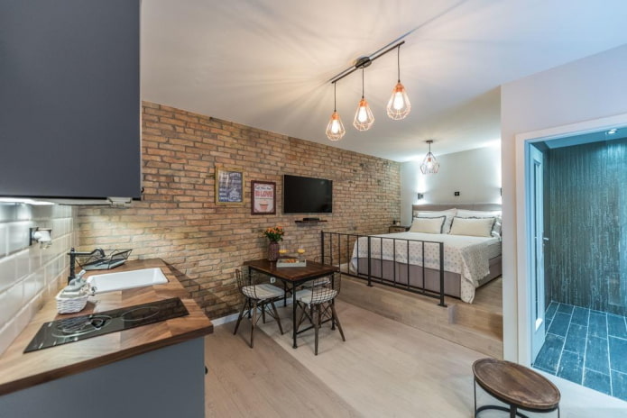 cama sobre um pódio no interior da cozinha
