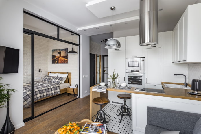 cama em um nicho no interior da cozinha