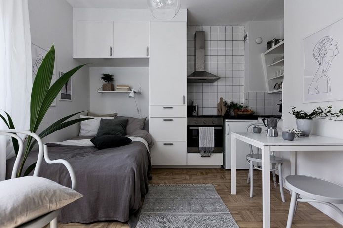 interior de uma pequena cozinha-quarto