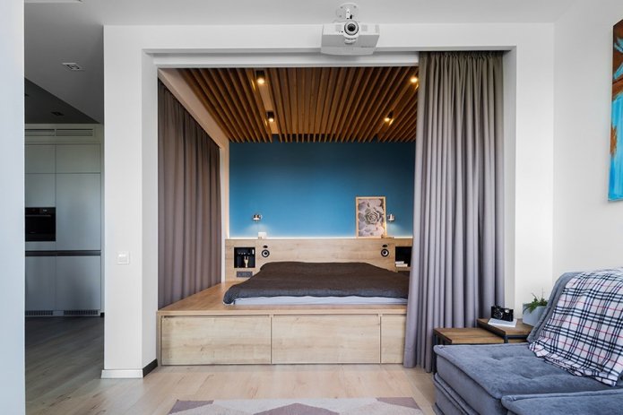 cama escondida na sala de estar