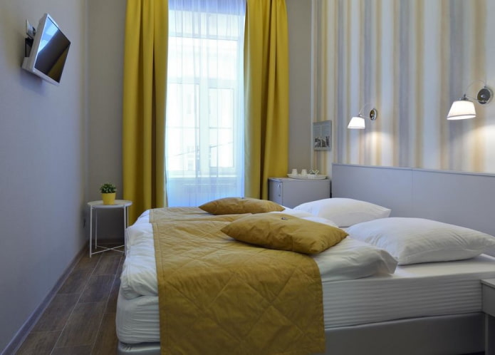 quarto cinza com detalhes brilhantes