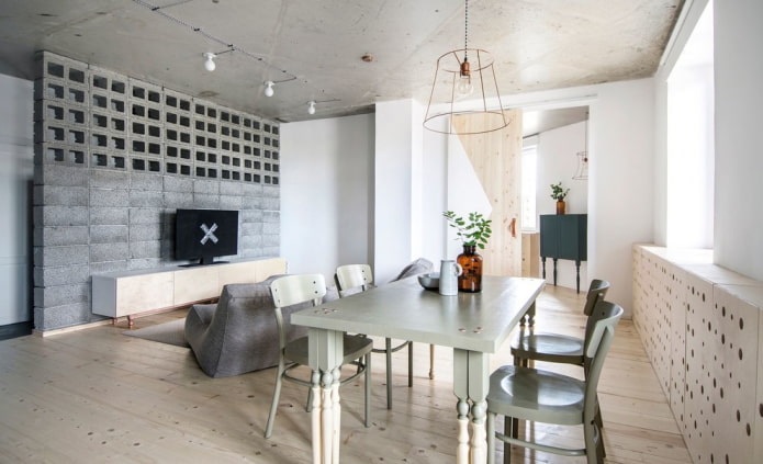 mesa cinza no interior em estilo loft