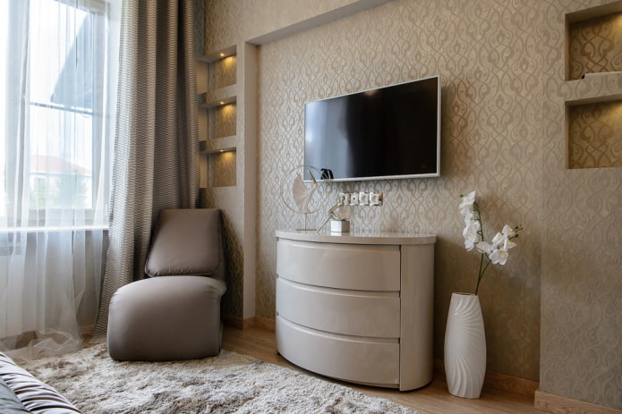 suporte oval para TV no interior