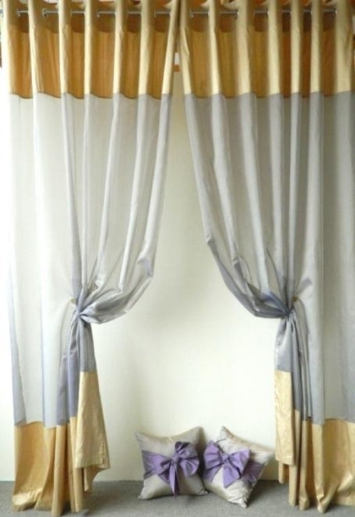 cortinas em ilhós com borda