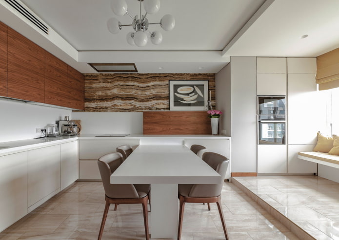 área de jantar no interior da cozinha em forma de canto