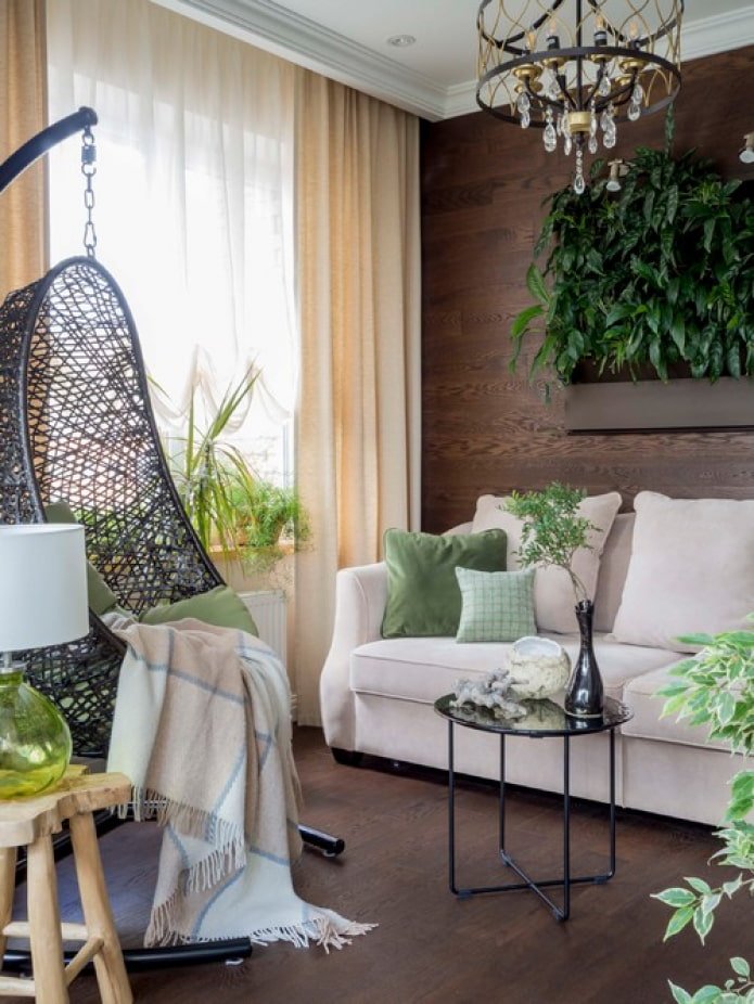 pintura de plantas acima do sofá