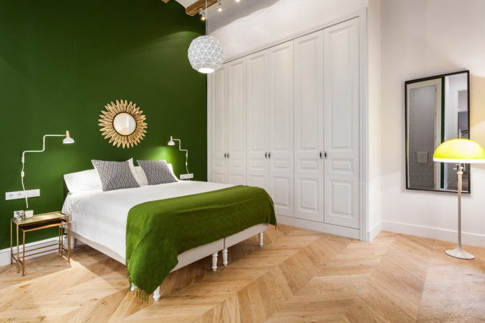 móveis no interior do quarto em tons de verde