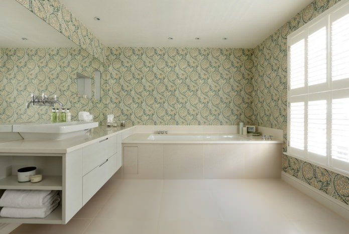 papel de parede com monogramas amarelos e verdes em um fundo branco