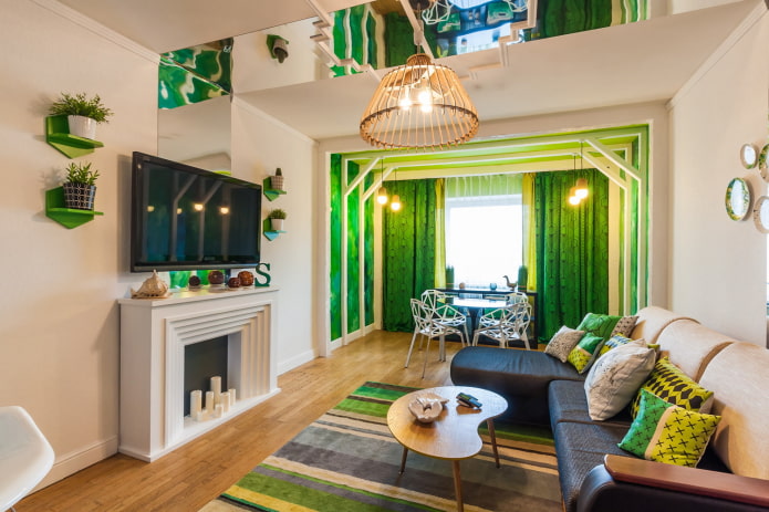 sala de estar iluminada com detalhes em verde