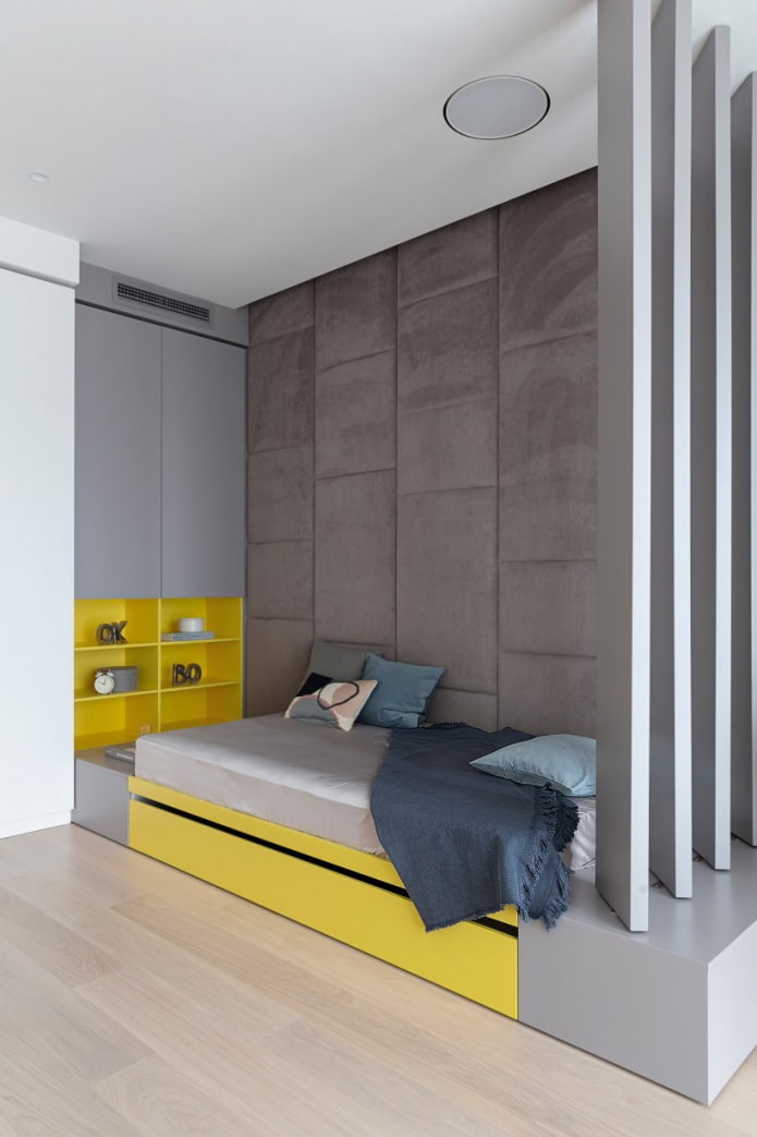 quarto minimalista com detalhes em amarelo