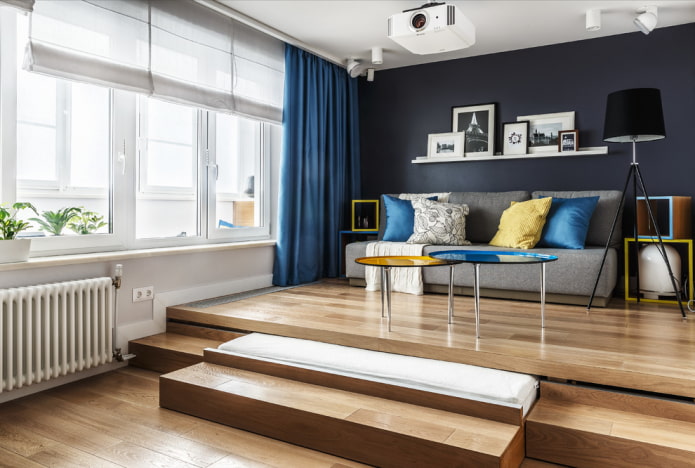 Sala de estar com pódio e cama