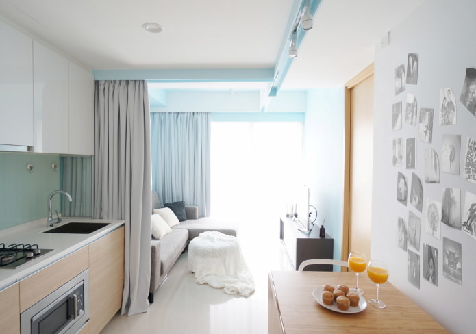 zoneamento da cozinha e da sala de estar com cortinas