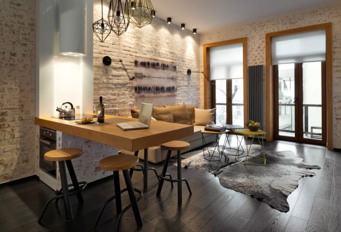 zoneamento com balcão de bar no interior da cozinha-sala de estar
