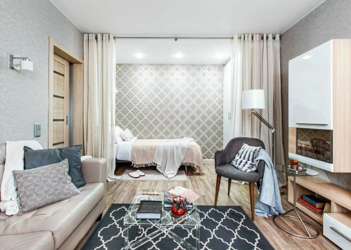 quarto em apartamento de um cômodo atrás de cortinas